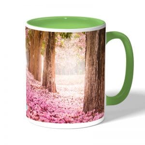 كوب قهوة بمقبض اخضر بتصميم اشجار الساكورا