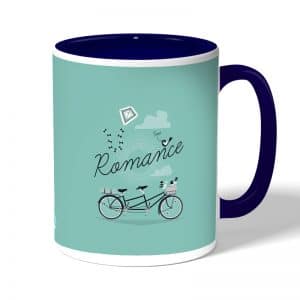 كوب قهوة بمقبض ازرق داكن بتصميم دراجه هوائيه