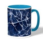 كوب قهوة بمقبض ازرق فاتح بتصميم أزرق وأبيض