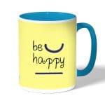كوب قهوة بمقبض ازرق فاتح بتصميم كن سعيد