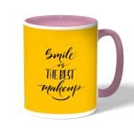 كوب قهوة بمقبض وردي بتصميم ابتسامه