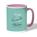 كوب قهوة بمقبض وردي بتصميم دراجه هوائيه